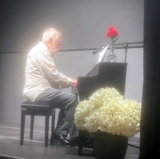 Peter Dent at
a piano